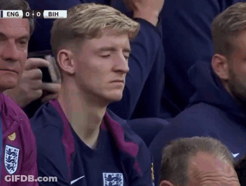A Group Of Men Are Watching A Soccer Game Between England And Bih GIF