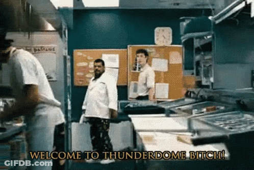 A Group Of Men In A Kitchen With The Words Welcome To Thunderdome Bitch GIF