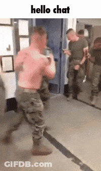 Men In Military Uniforms Standing In Hallway GIF