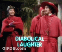 A Group Of Men In Red Robes Are Standing Next To Each Other With The Words Diabolical Laughter Written On The Bottom . GIF