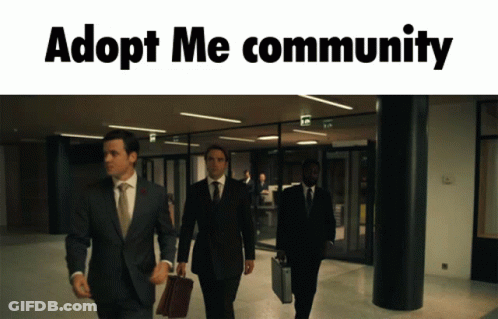 A Group Of Men In Suits And Ties Are Walking Down A Hallway With Adopt Me Community Written Above Them GIF