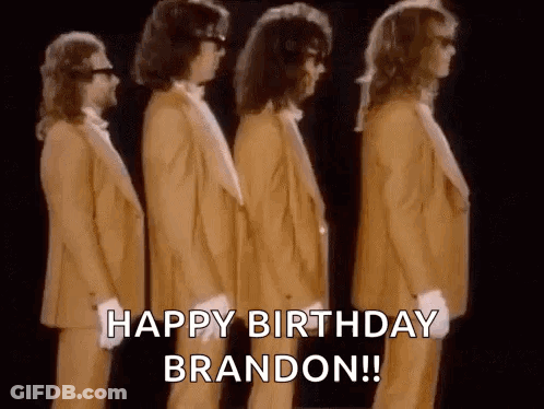 A Group Of Men In Suits Are Standing Next To Each Other In A Row And Saying `` Happy Birthday Brandon '' . GIF