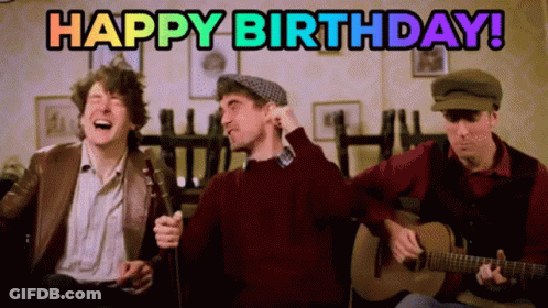 A Group Of Men Singing And Playing Guitars With The Words Happy Birthday In The Background GIF