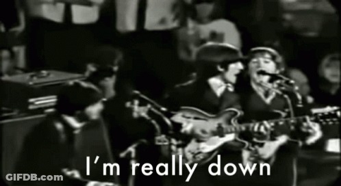 A Group Of Men Singing And Playing Guitars With The Words " I 'M Really Down " Above Them GIF