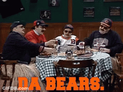 A Group Of Men Sitting At A Table With The Words Da Bears Written On The Bottom GIF