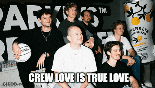 A Group Of Men Sitting In Front Of A Can Of Sparkly 'S Hard Seltzer GIF