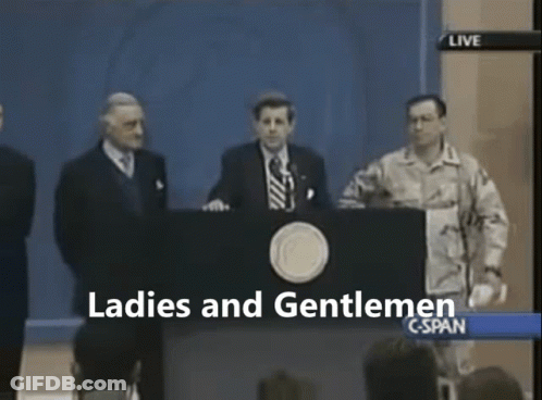 A Group Of Men Standing Behind A Podium With The Words Ladies And Gentlemen On The Screen GIF