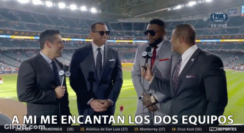 A Group Of Men Standing In Front Of A Fox Sports Broadcast GIF