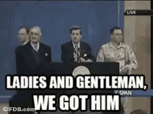 A Group Of Men Standing In Front Of A Podium With The Words Ladies And Gentleman We Got Him GIF