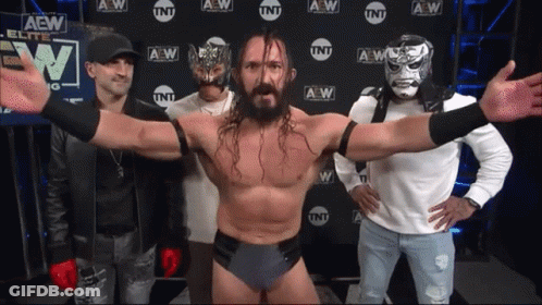 A Group Of Men Standing In Front Of A Wall That Says Aew On It GIF