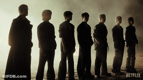 A Group Of Men Standing Next To Each Other With The Word Netflix On The Bottom GIF
