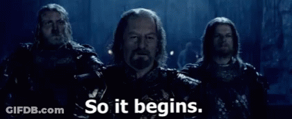 A Group Of Men Standing Next To Each Other With The Words `` So It Begins . '' GIF