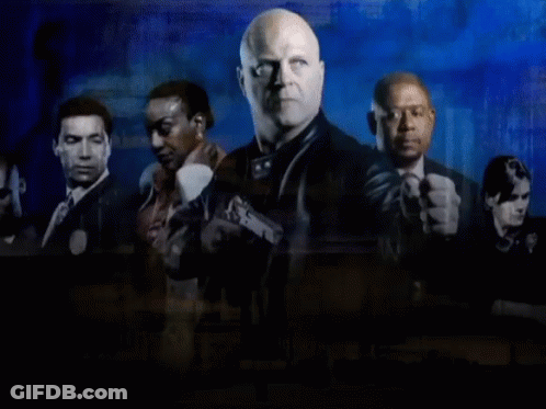 A Group Of Men Standing Next To Each Other With The Words " The Shield " On The Bottom GIF