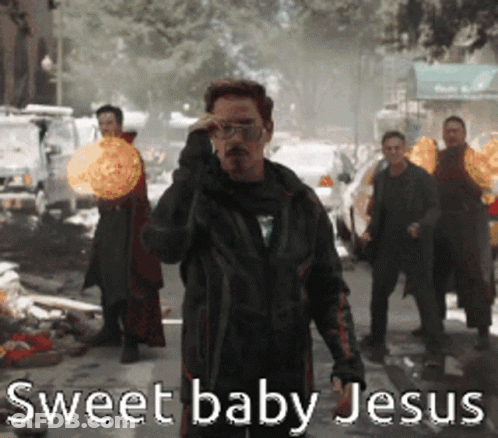 A Group Of Men Standing On A Street With The Words Sweet Baby Jesus Written On The Bottom GIF