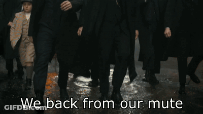 A Group Of Men Walking With The Words We Back From Our Mute Written Below Them GIF
