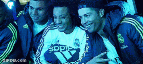 A Group Of Men Wearing Adidas Jackets Are Posing For A Picture Together GIF