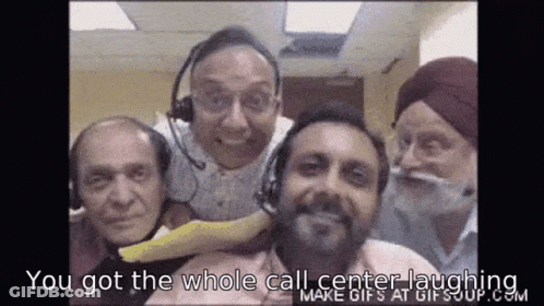 A Group Of Men Wearing Headsets Are Posing For A Picture And The Caption Says You Got The Whole Call Center Laughing GIF