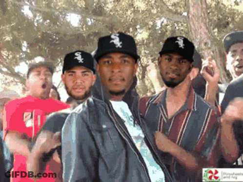 A Group Of Men Wearing White Sox Hats GIF