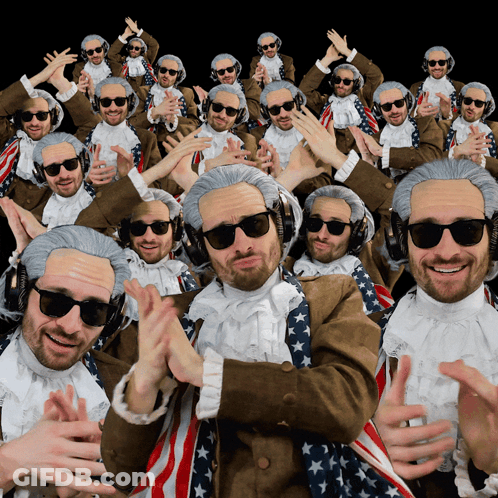 A Group Of Men Wearing Wigs And Sunglasses Are Dancing GIF