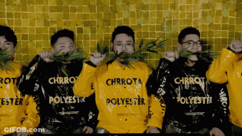 A Group Of Men Wearing Yellow Sweatshirts That Say Chrrot Polyester GIF