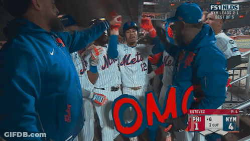 A Group Of Mets Baseball Players Holding A Sign That Says " Omg " GIF