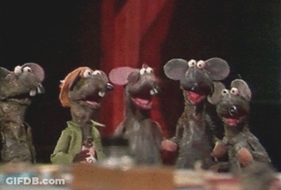 A Group Of Mice Standing Next To Each Other With Their Mouths Open GIF