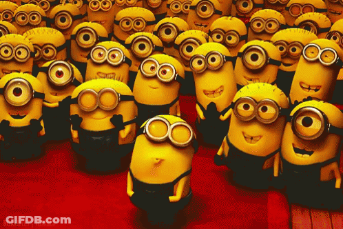 A Group Of Minions Are Gathered Together And One Of Them Is Wearing Sunglasses GIF