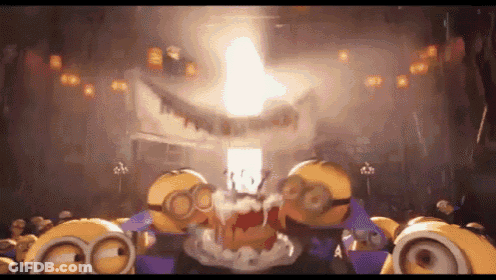 A Group Of Minions Are Standing In A Dark Room With A Light Shining Through The Ceiling . GIF