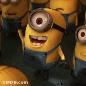 A Group Of Minions Are Standing In A Line And One Of Them Is Smiling GIF