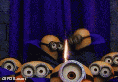 A Group Of Minions Are Standing In Front Of A Purple Curtain With A Flame Coming Out Of It . GIF