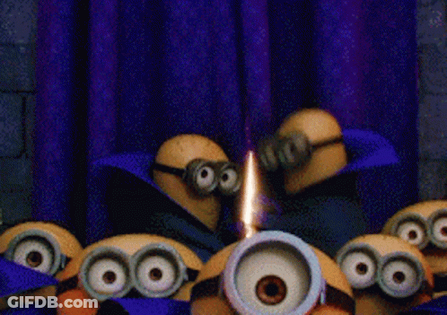 A Group Of Minions Are Standing In Front Of A Purple Curtain GIF