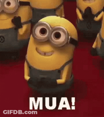 A Group Of Minions Are Standing Next To Each Other On A Red Carpet . One Of The Minions Is Wearing Goggles . GIF