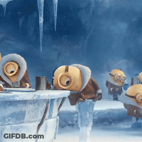A Group Of Minions Standing In A Cave With Icicles Hanging From The Ceiling GIF