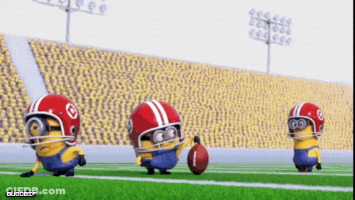 A Group Of Minions Wearing Football Helmets And Holding A Football GIF