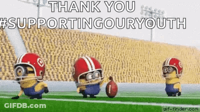 A Group Of Minions Wearing Football Helmets Are Running On A Field With A Football . GIF