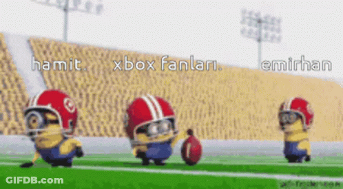 A Group Of Minions Wearing Football Helmets On A Field With The Words Hamil Xbox Fanlari Written On The Bottom GIF