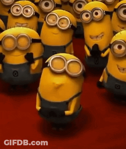Minions In Goggles And Overalls On Red Carpet GIF