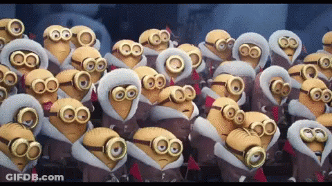 A Group Of Minions Wearing Hoods And Goggles Are Gathered Together GIF