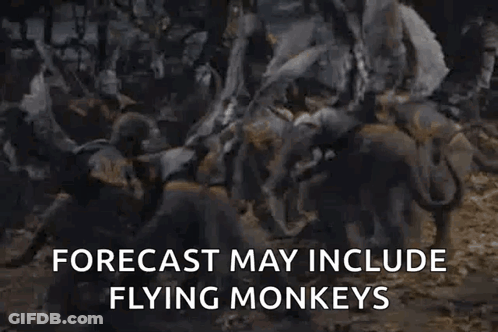 A Group Of Monkeys Are Standing Next To Each Other In A Forest . GIF
