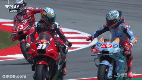 A Group Of Motorcycle Racers Are Racing On A Track With Replay Written On The Bottom GIF