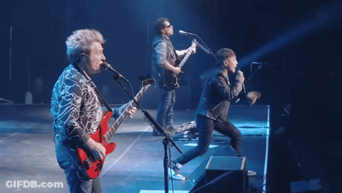 A Group Of Musicians Are On Stage With The Word Don 'T In Red GIF