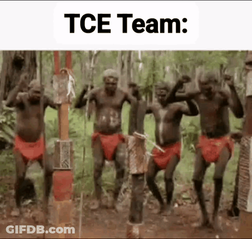 A Group Of Native Americans Are Dancing In A Forest . GIF