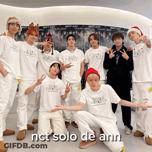 A Group Of Nct Solo De Ann Members Pose For A Picture GIF