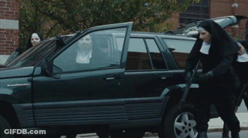 A Group Of Nuns Standing Around A Grand Cherokee GIF