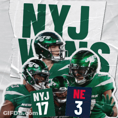 A Group Of Ny Jets Players Are Holding Up Signs GIF