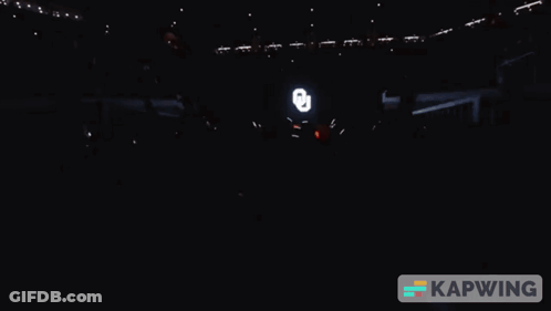 A Group Of Oklahoma Cowboys Football Players Huddle Together GIF