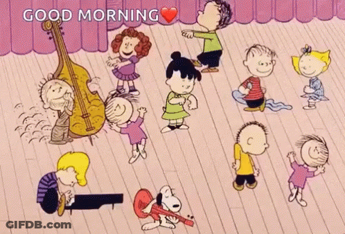 A Group Of Peanuts Characters Are Dancing On A Stage With The Words Good Morning Written Above Them GIF