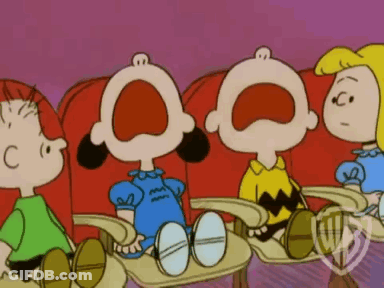 A Group Of Peanuts Characters Sitting In Red Chairs With Their Mouths Wide Open GIF