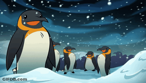 A Group Of Penguins Are Standing In A Snowy Field GIF