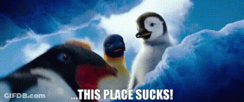 A Group Of Penguins Standing Next To Each Other On Top Of A Snow Covered Iceberg . GIF